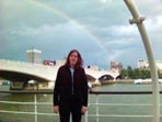 Melanie in front of a rainbow in London